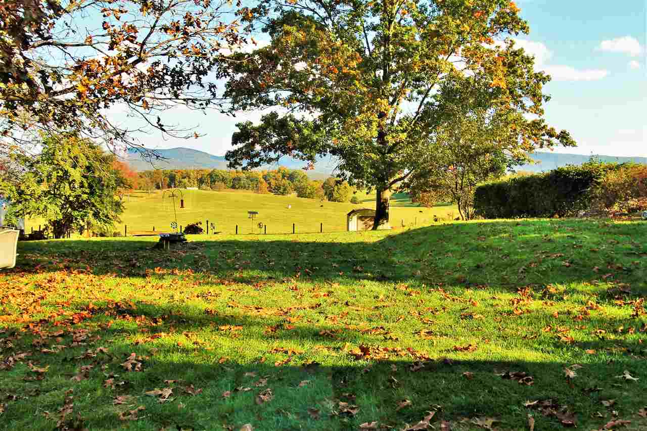 95 Cattle Scales Road Waynesboro, VA 22980 - Photo 8 of 50 a view of a lake with a big yard