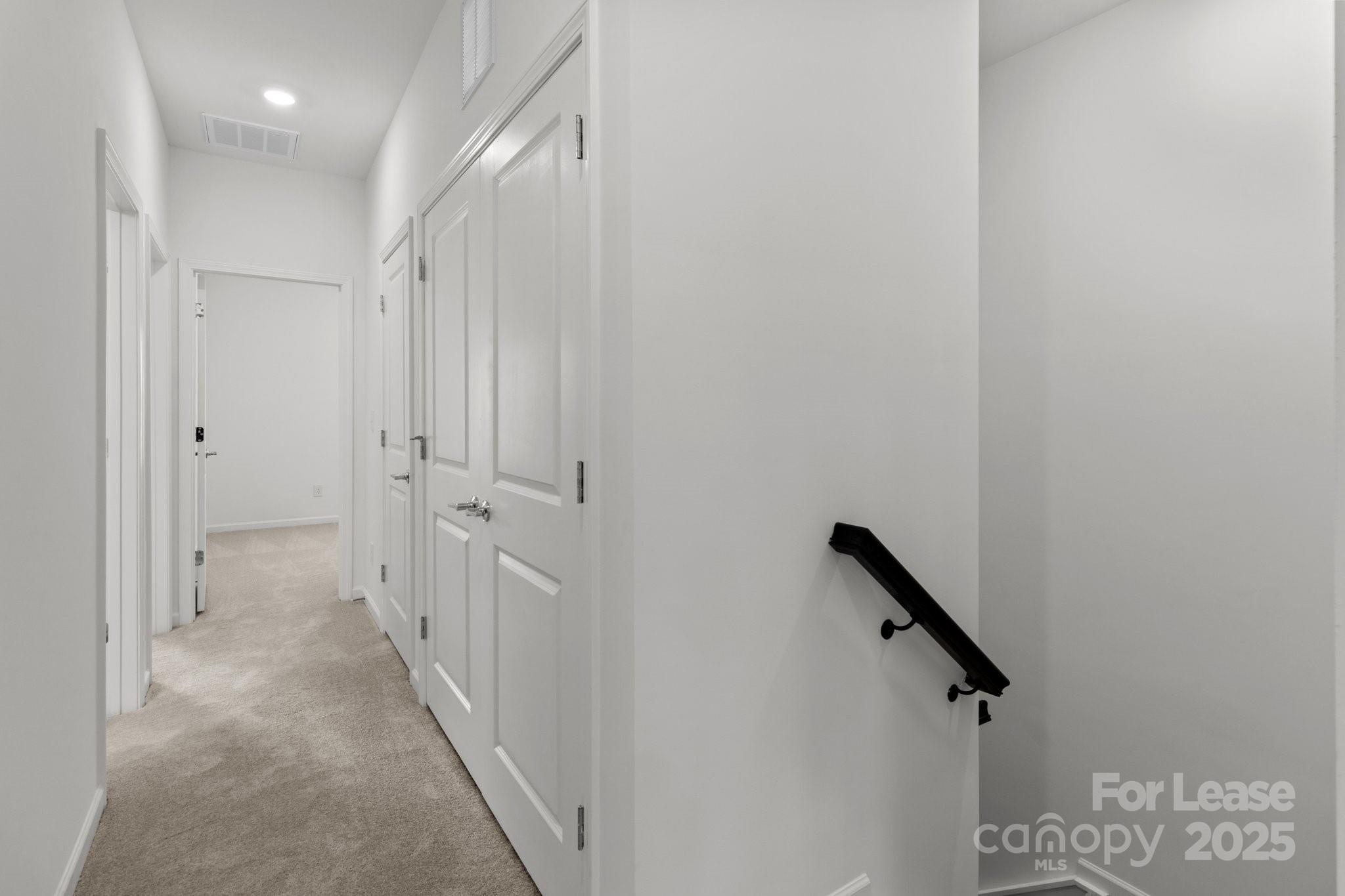 109 Goodson Place Davidson, NC 28036 - Photo 13 of 22 a view of a hallway with a elevator