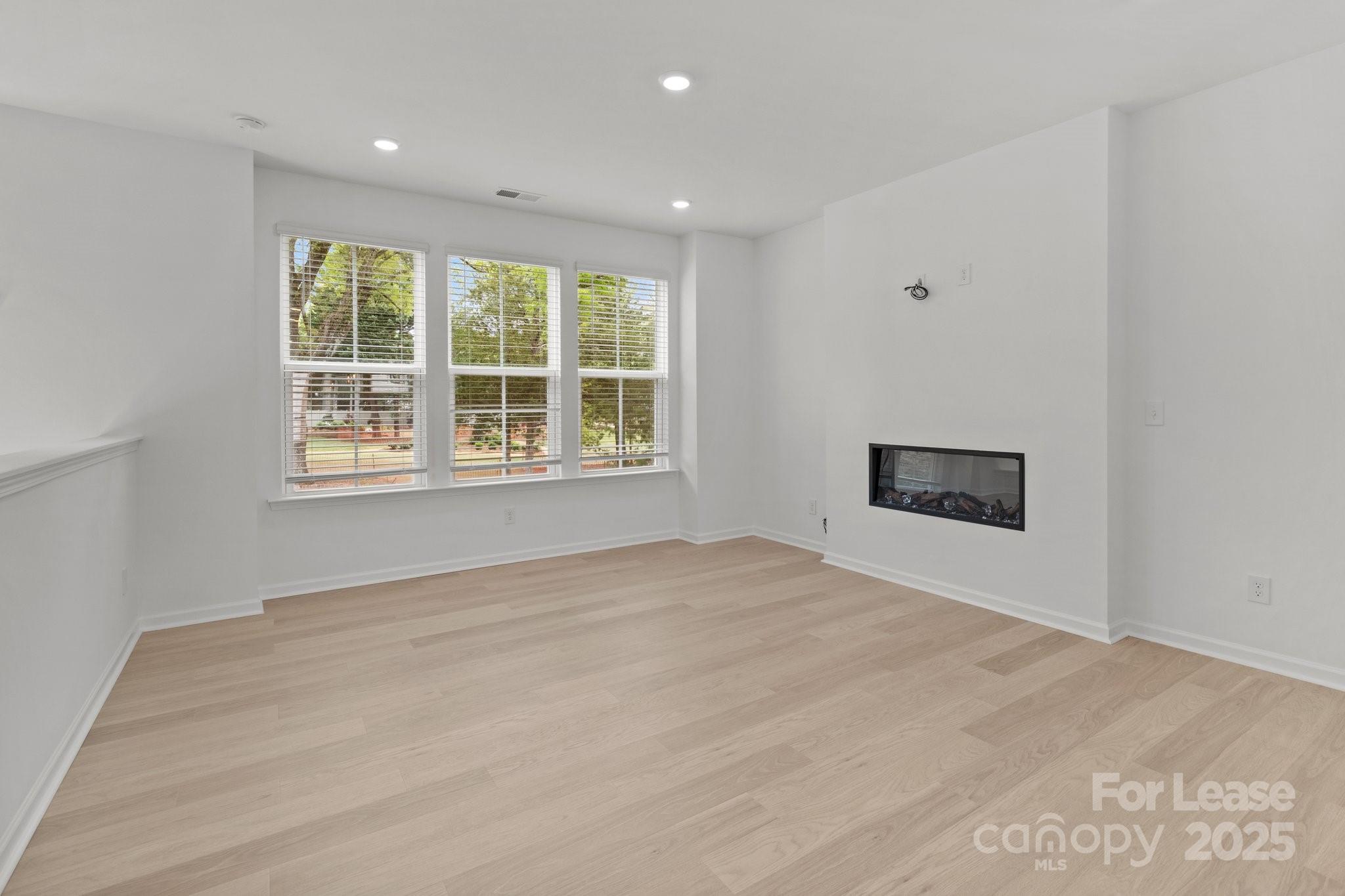 109 Goodson Place Davidson, NC 28036 - Photo 19 of 22 a view of an empty room with a window