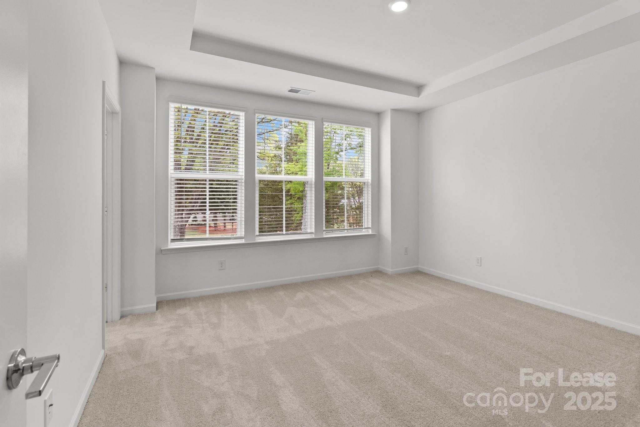 109 Goodson Place Davidson, NC 28036 - Photo 7 of 22 an empty room with a window