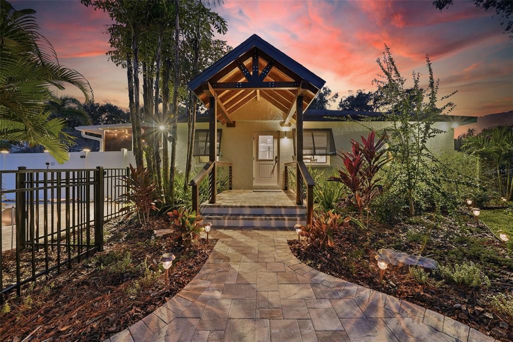 1830 Main Street Safety Harbor, FL 34695 - Photo 1 of 90 a front view of a house having yard