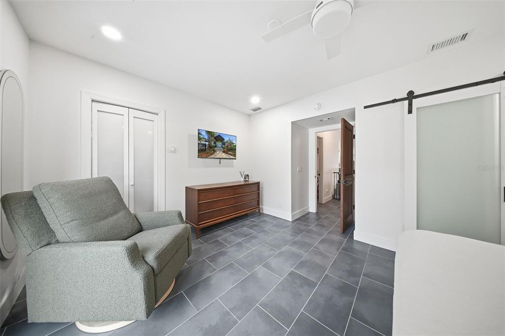 1830 Main Street Safety Harbor, FL 34695 - Photo 29 of 90 a living room with furniture and a window