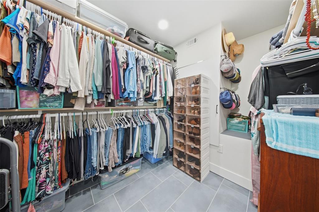 1830 Main Street Safety Harbor, FL 34695 - Photo 30 of 90 a view of walk in closet with clothes