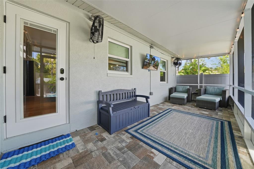 1830 Main Street Safety Harbor, FL 34695 - Photo 53 of 90 a living room with furniture and a flat screen tv
