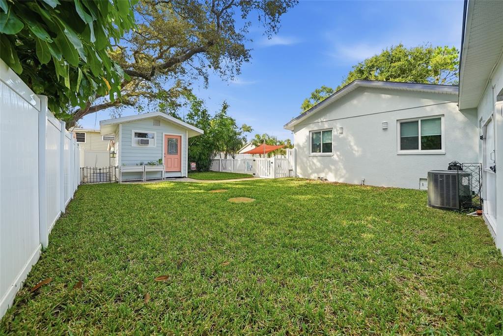1830 Main Street Safety Harbor, FL 34695 - Photo 60 of 90 a front view of house with yard and green space