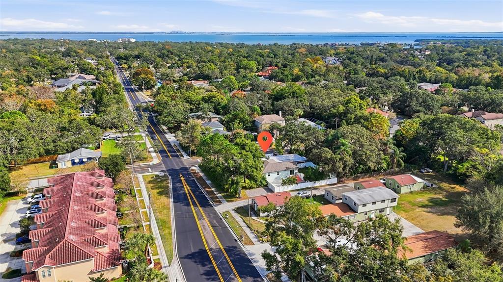 1830 Main Street Safety Harbor, FL 34695 - Photo 84 of 90 an aerial view of residential houses with outdoor space and street view