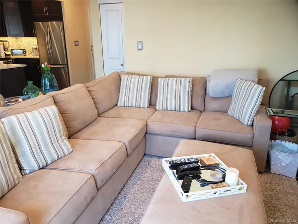 a living room with furniture and a couch