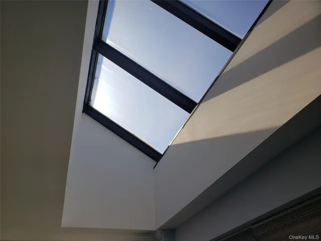 a bedroom with a bed and flat screen tv