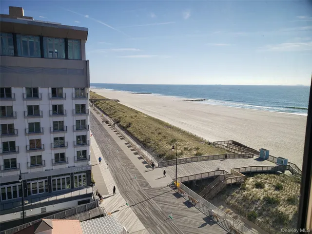 a view of a balcony with an ocean