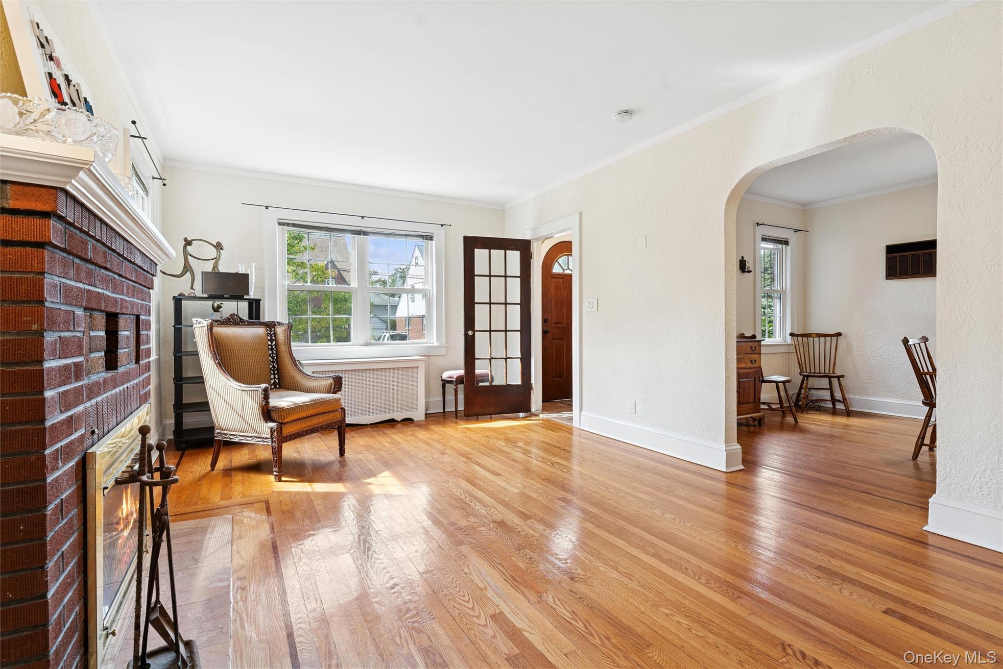 9 Troy Place Merrick, NY 11566 - Photo 5 of 23 a living room with furniture and a wooden floor