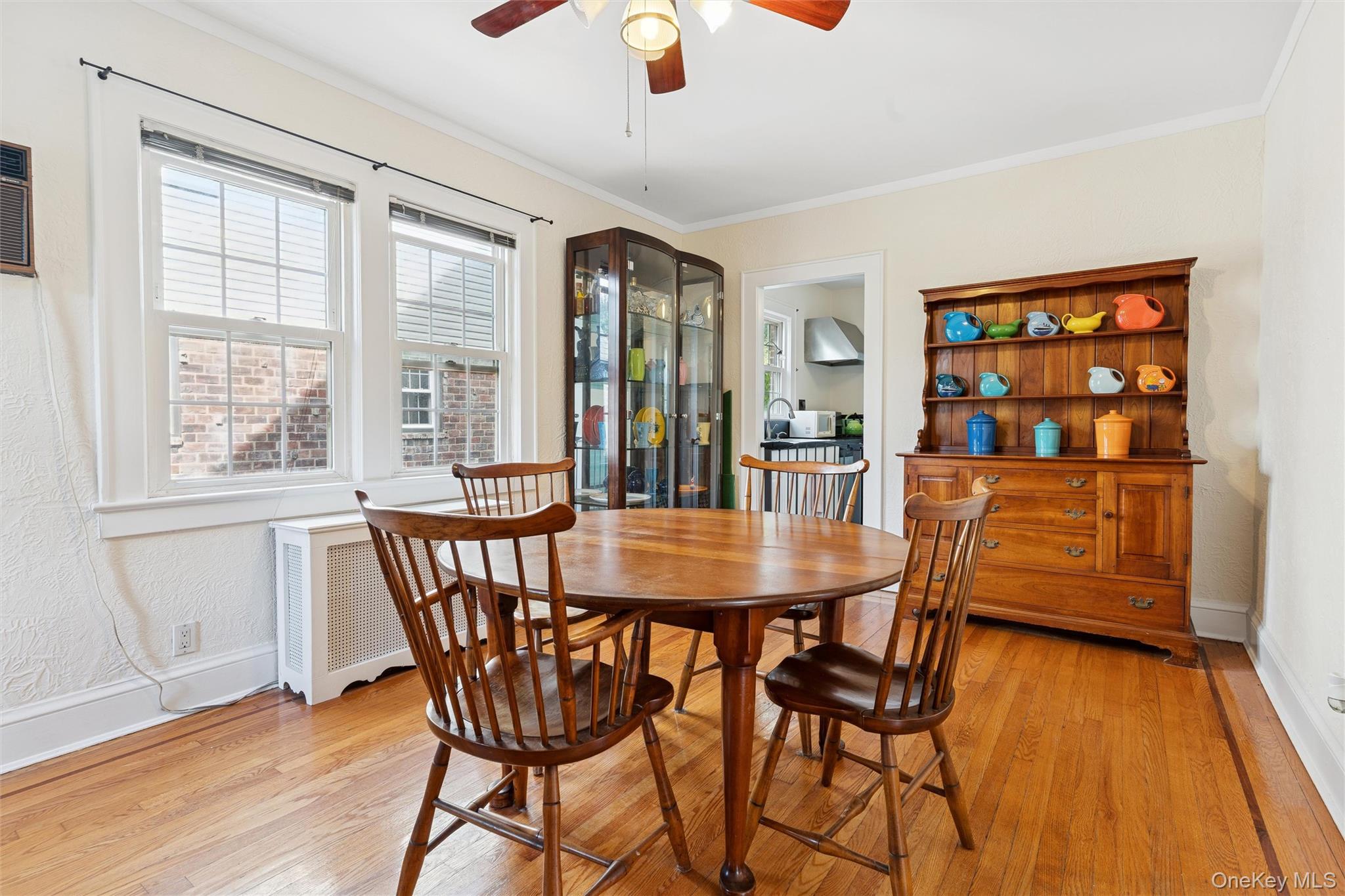 9 Troy Place Merrick, NY 11566 - Photo 6 of 23 a view of a dining room with furniture and wooden floor