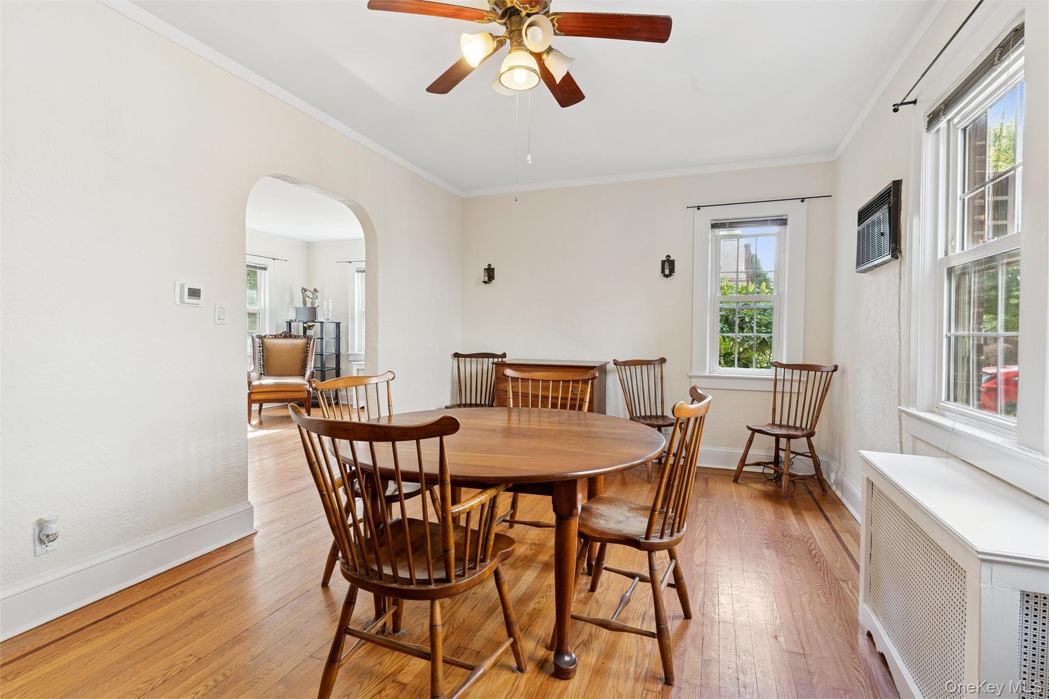 9 Troy Place Merrick, NY 11566 - Photo 7 of 23 a view of a dining room with furniture window and wooden floor