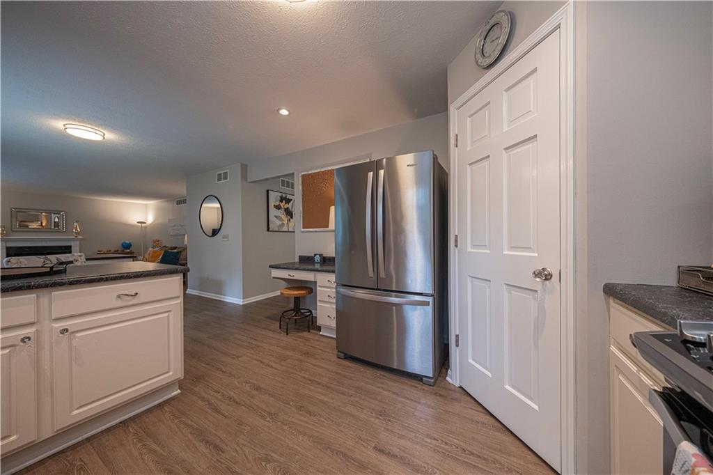 435 Cottage Lane Monroeville, PA 15146 - Photo 10 of 46 Functional kitchen layout featuring a pantry, workstation, generous cabinetry, and ample counter space.