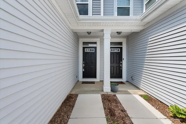 a view of a pathway besides a house