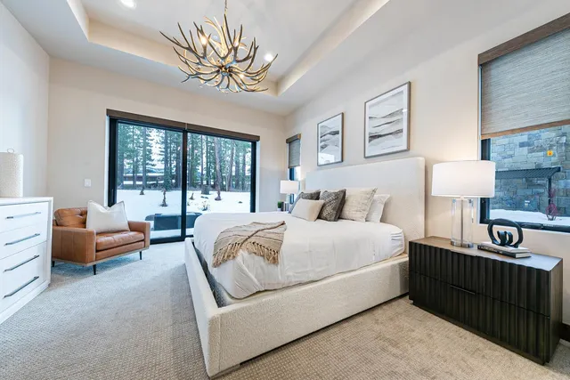 a bedroom with a bed and a couch