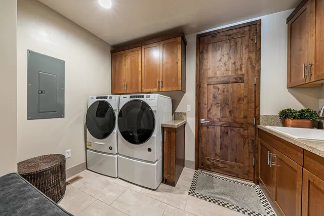 a utility room with dryer and washer