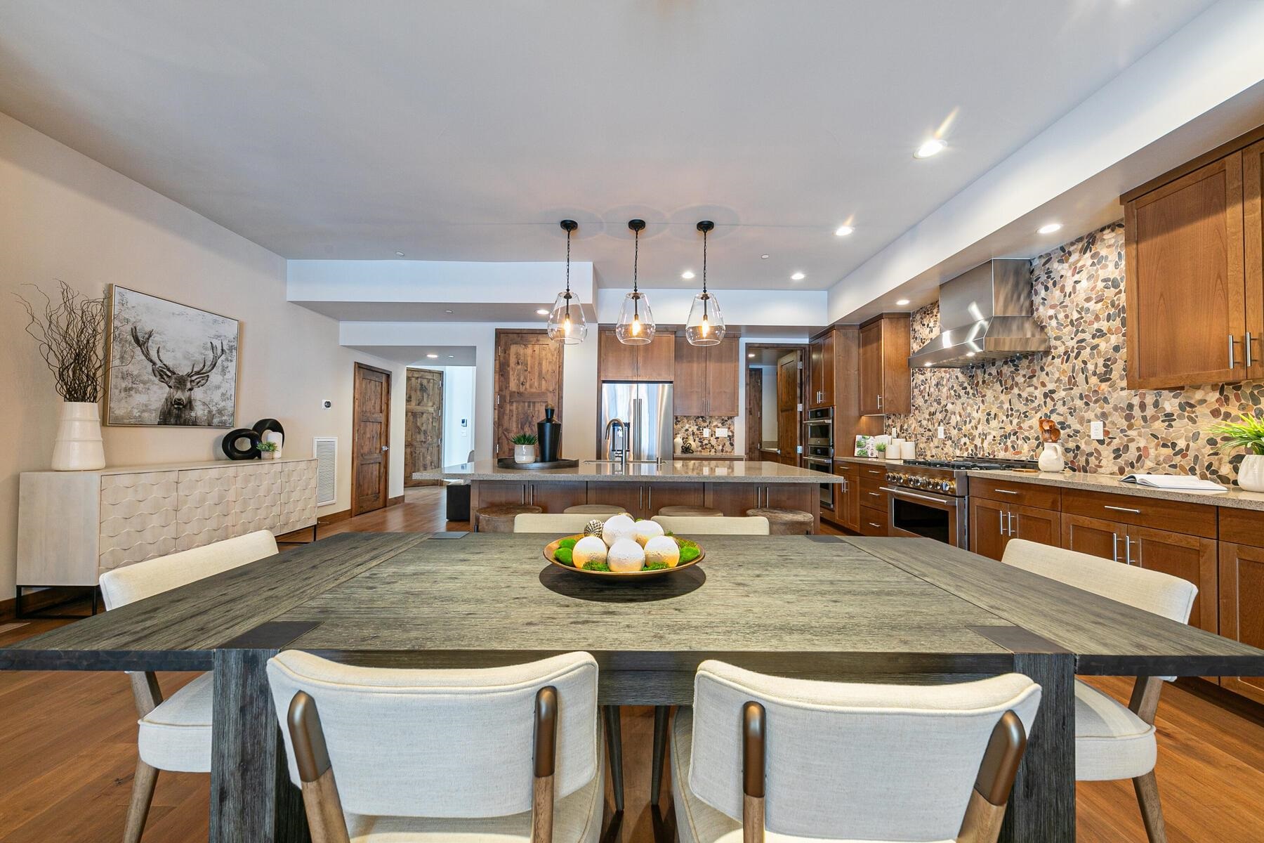 10232 Modane Place Truckee, CA 96161 - Photo 7 of 26 a kitchen with a table and chairs in it