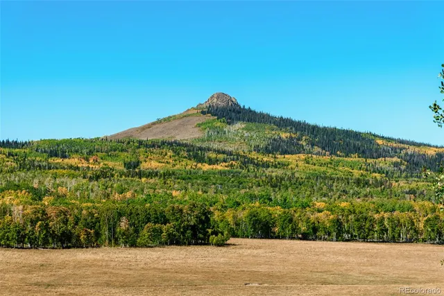 a view of a lake with a mountain in the background