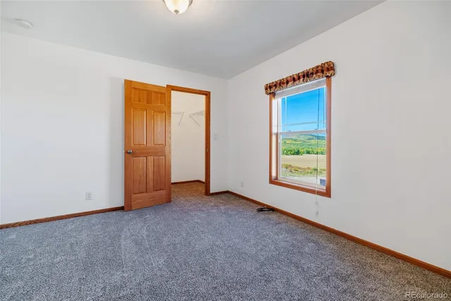 an empty room with window