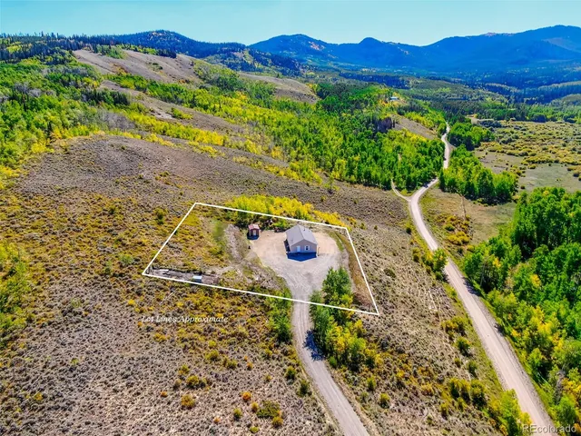 a view of a backyard with plants
