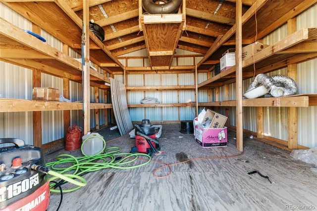 a play room with lots of wooden furniture