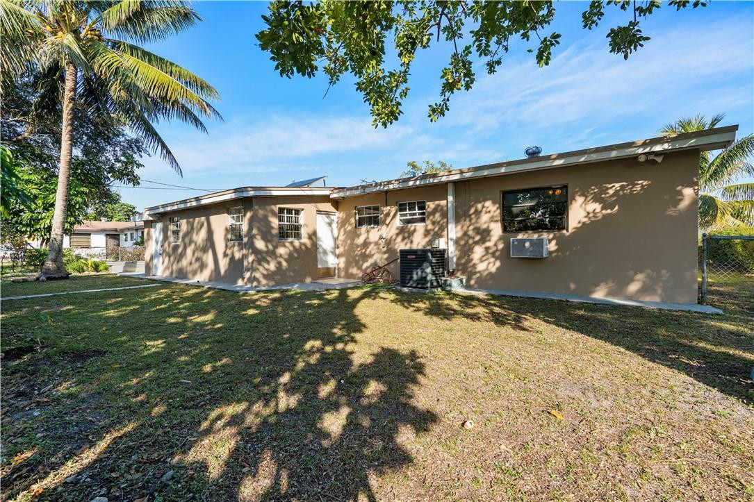 Undisclosed Address Miami, FL 33169 - Photo 22 of 24 a view of a yard with an tree