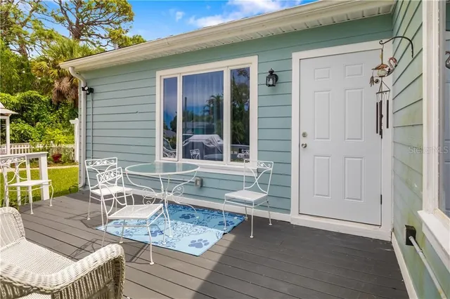 a view of house with outdoor seating space