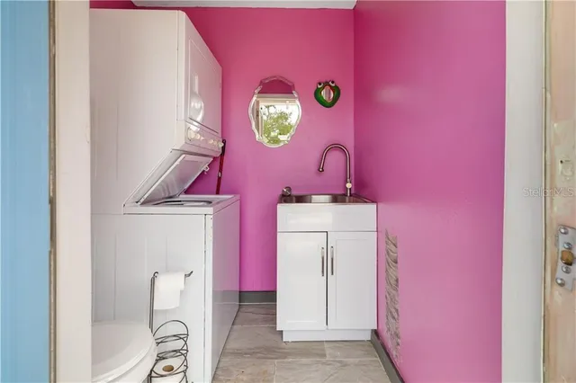 a bathroom with a sink toilet and vanity