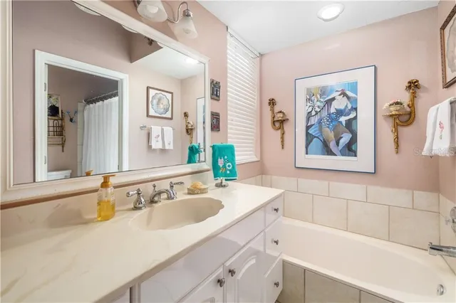 a bathroom with a sink and a bathtub