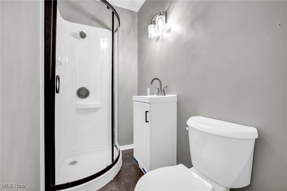 3930 Wadsworth Road Barberton, OH 44203 - Photo 23 of 30 Bathroom featuring vanity and a stall shower