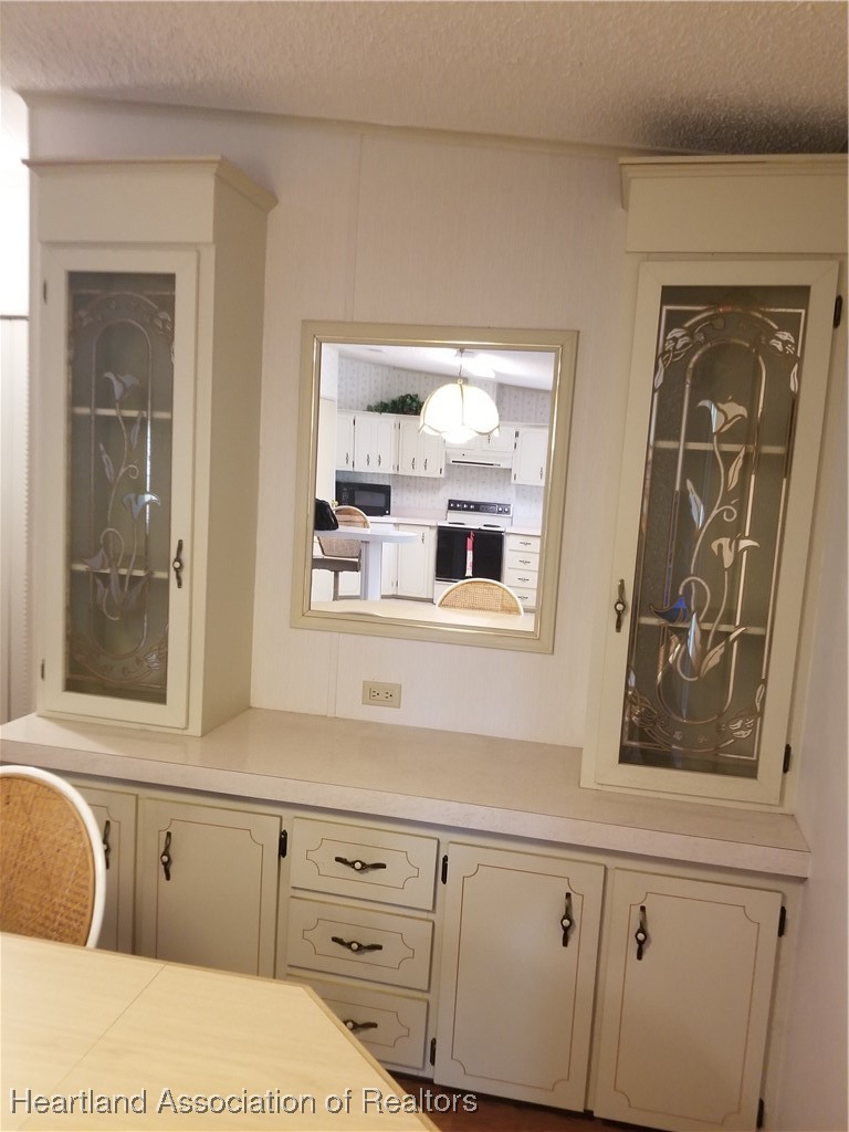 9125 Spur Path Sebring, FL 33875 - Photo 9 of 31 Built-in dining area hutch