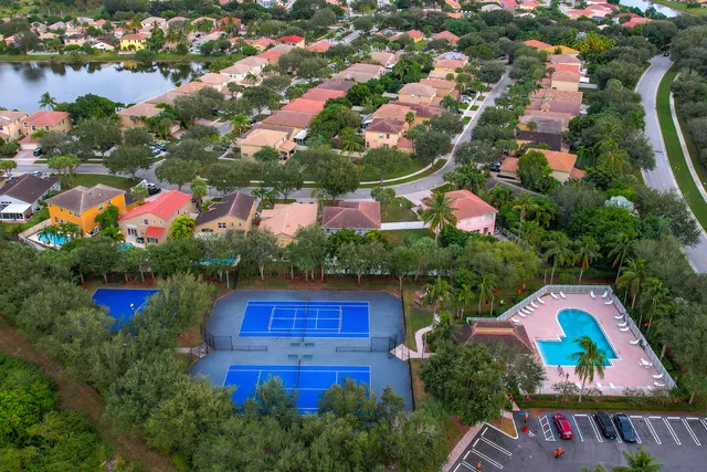 an aerial view of house with yard