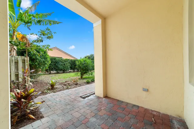 a view of a pathway with a yard