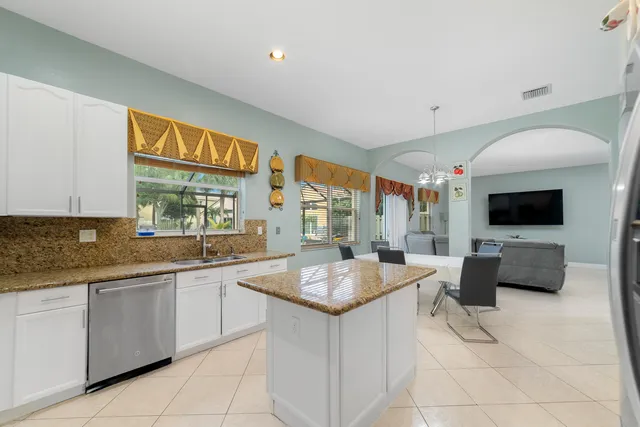 a kitchen with a sink and counter top space