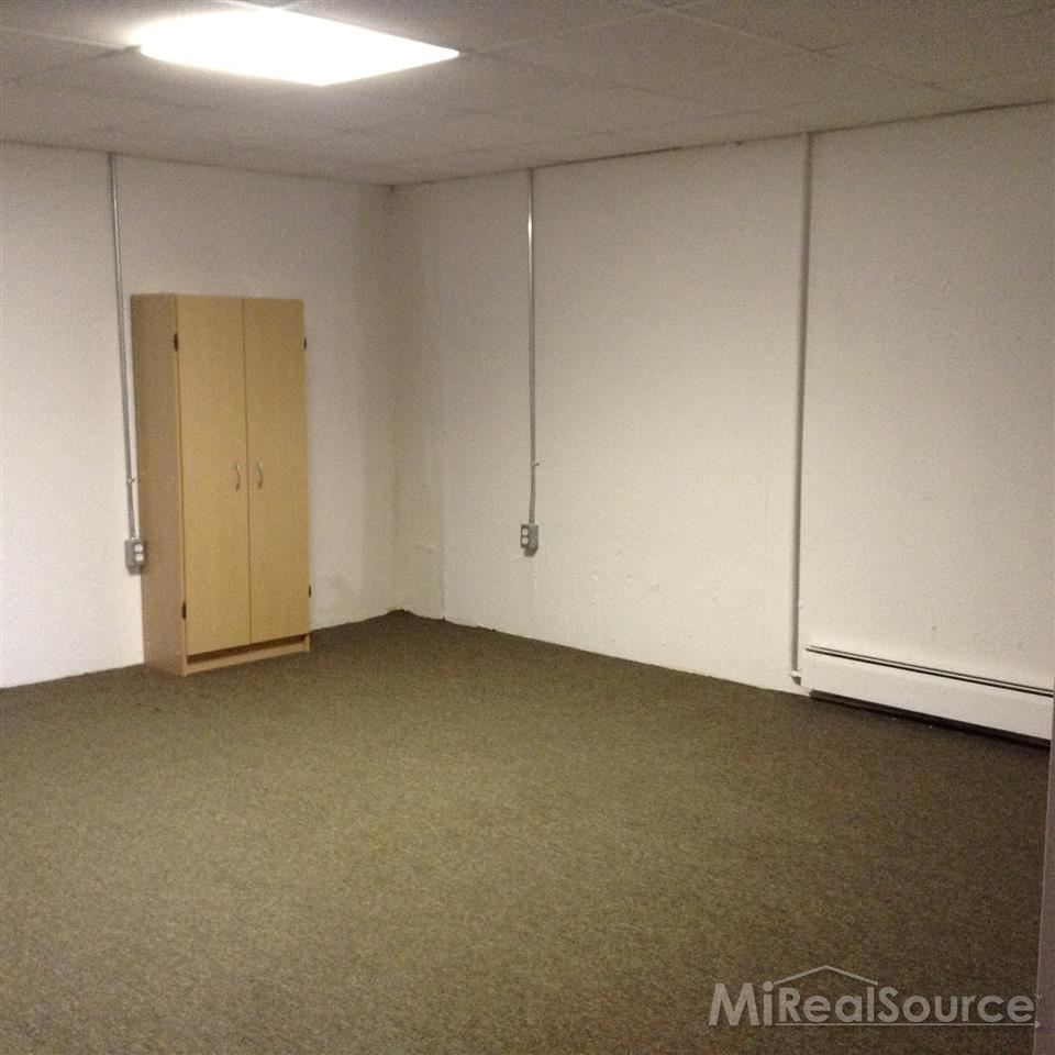 1135 Tienken Court, Unit 17 Rochester, MI 48306 - Photo 21 of 25 Bright Finished Basement