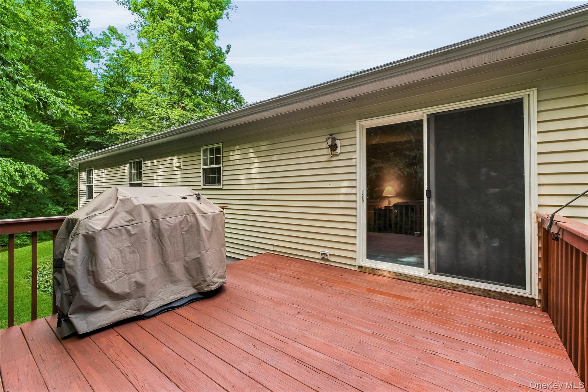 45 Wiccopee Road Putnam Valley, NY 10579 - Photo 31 of 38 Step out from the family room for all your outdoor celebrations