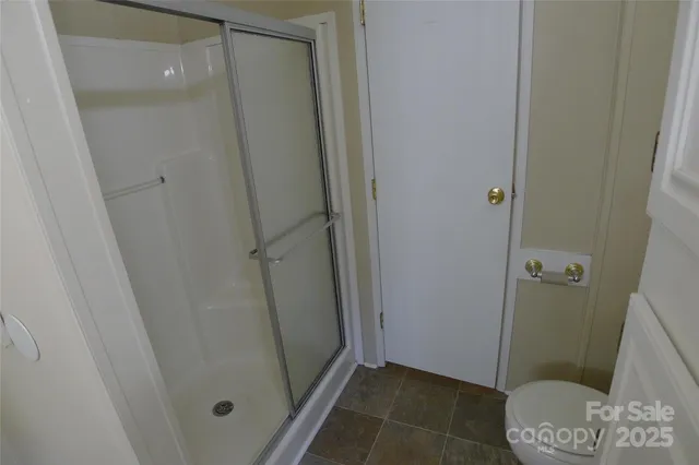 a bathroom with a sink and toilet