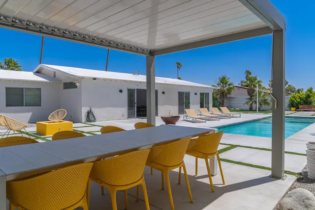 a view of a house with swimming pool