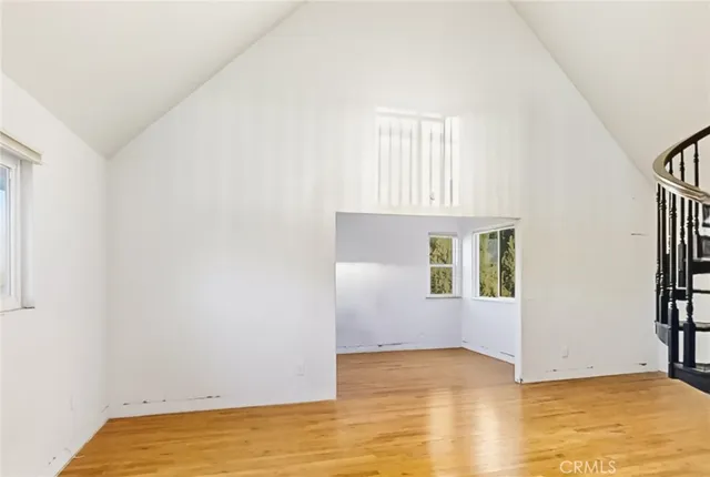 an empty room with windows