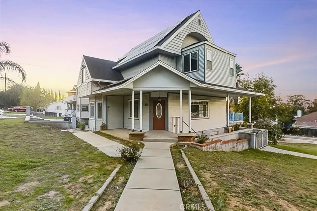 a front view of a house with swimming pool