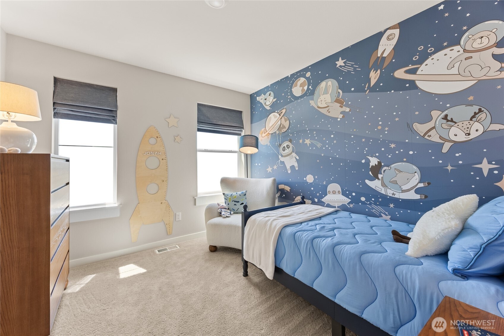 26866 Northeast 143rd Circle, Unit 19 Duvall, WA 98019 - Photo 22 of 29 a bedroom with bed and a window