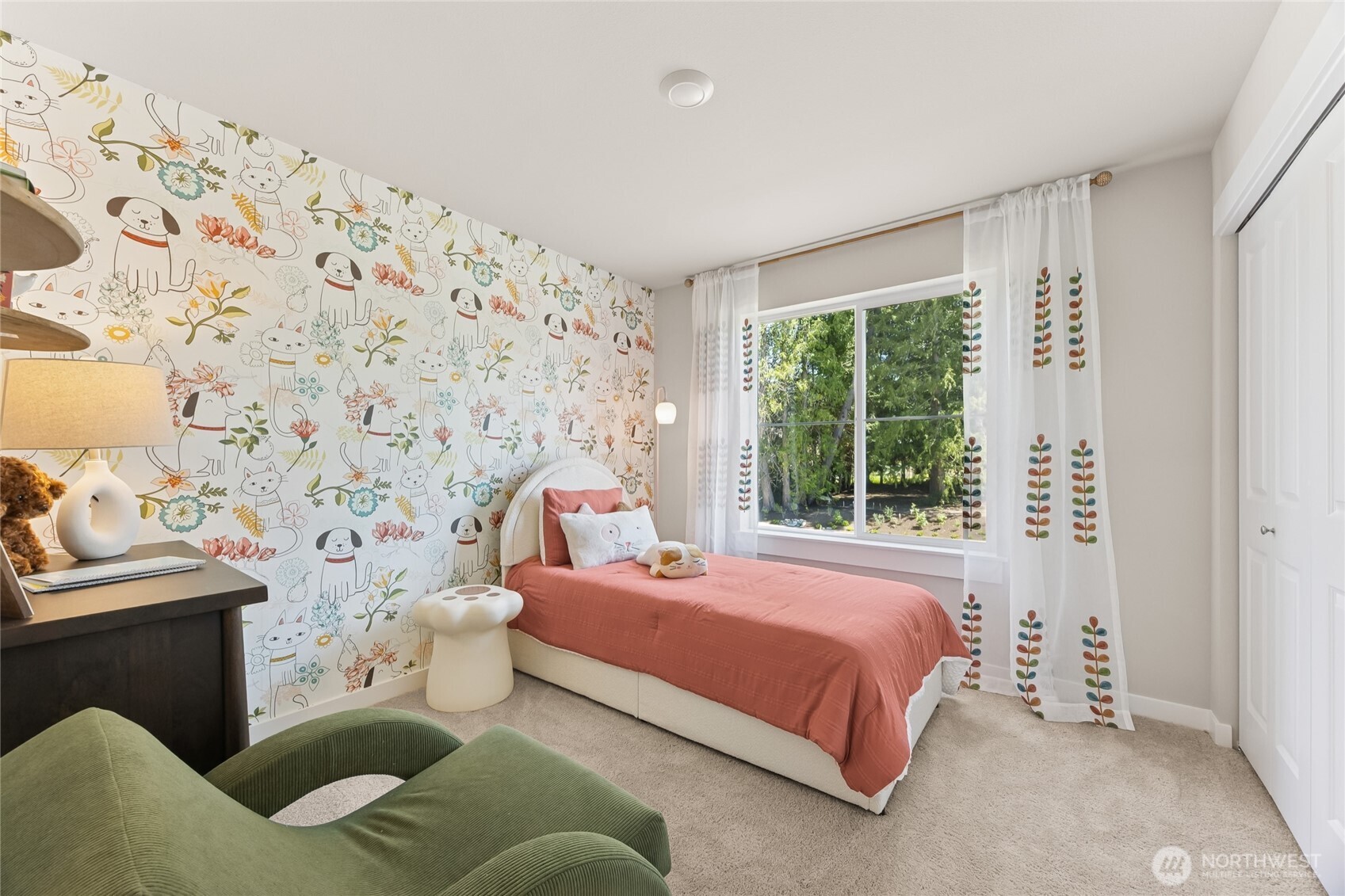 26866 Northeast 143rd Circle, Unit 19 Duvall, WA 98019 - Photo 23 of 29 a bedroom with a bed couch and window