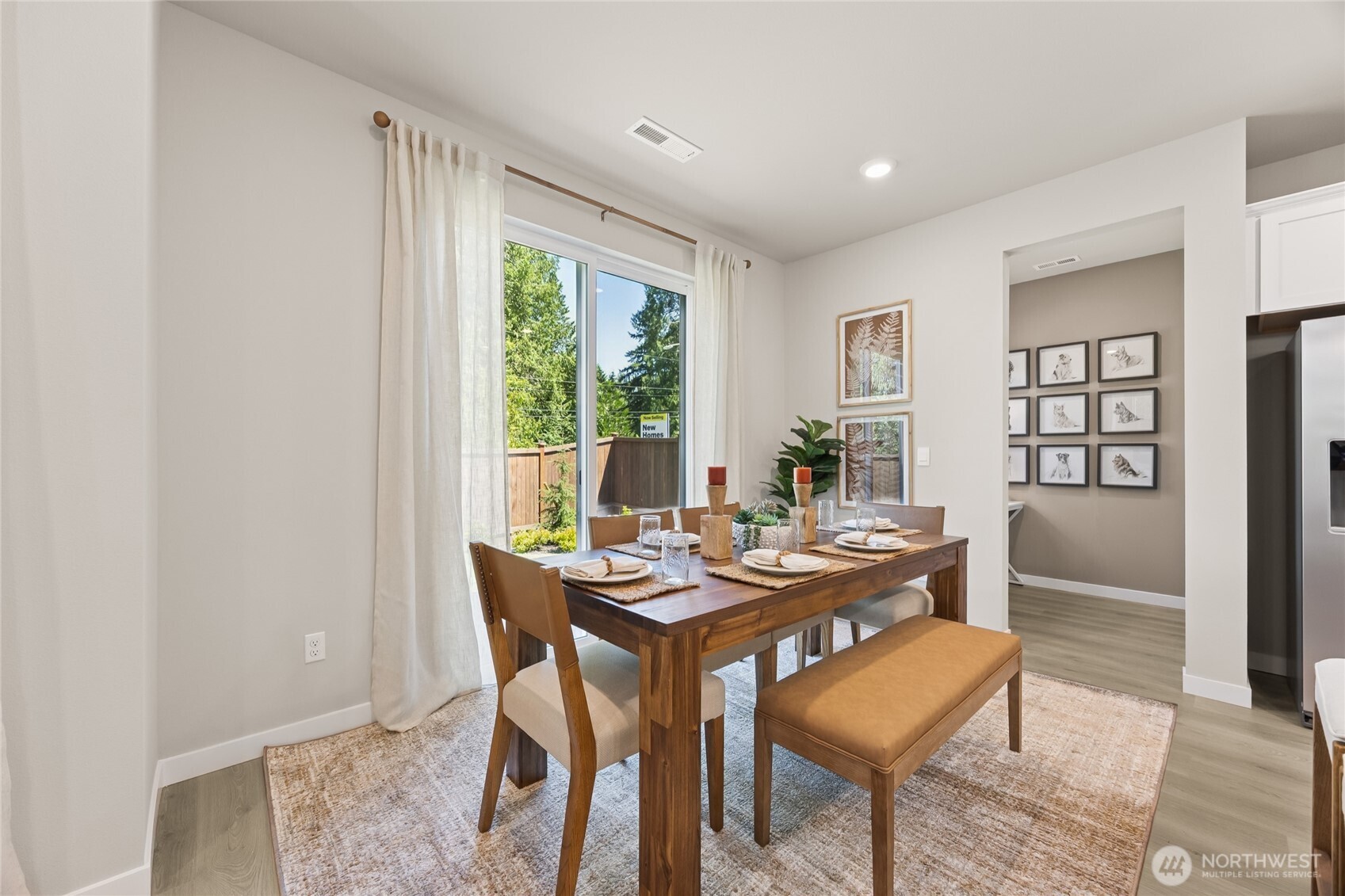 26866 Northeast 143rd Circle, Unit 19 Duvall, WA 98019 - Photo 8 of 29 a view of a dining room with furniture window and outside view
