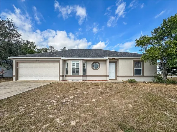 front view of house with a yard