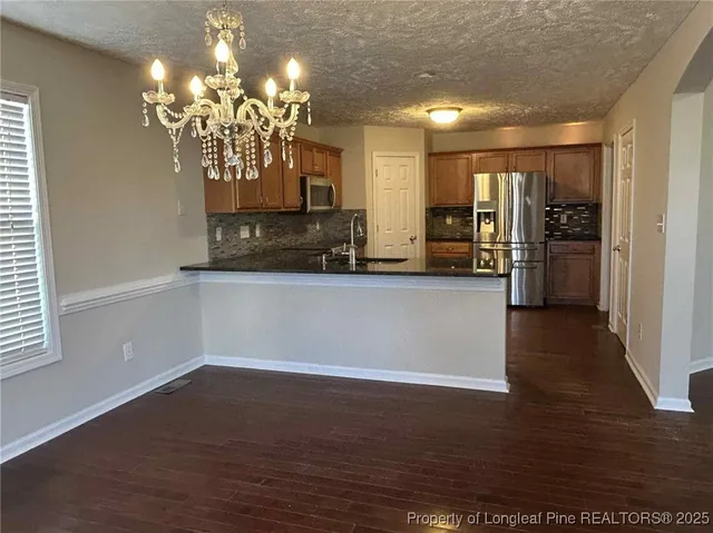 a view of a chandelier in a room