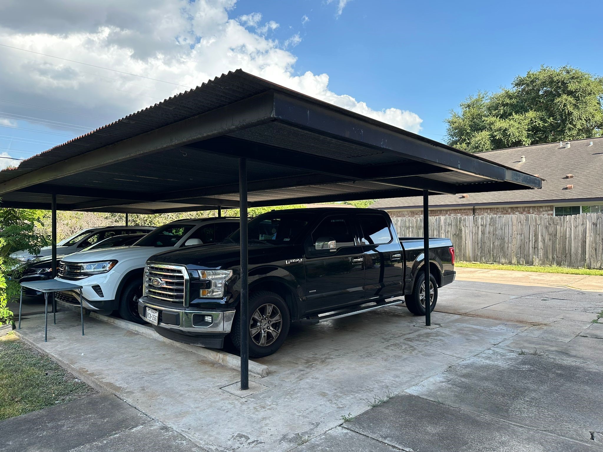 7305 South Gessner Road Houston, TX 77036 - Photo 14 of 24 a car parked in front of a house