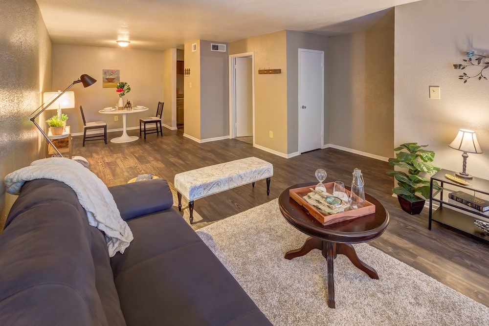 480 West Parker Road, Unit 99 Houston, TX 77091 - Photo 6 of 15 a living room with furniture and a table