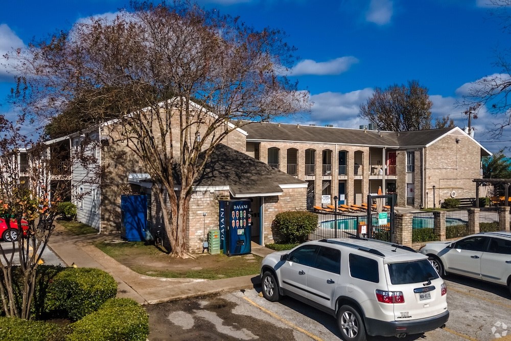 480 West Parker Road, Unit 99 Houston, TX 77091 - Photo 7 of 15 a car parked in front of a building