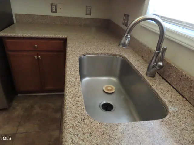 a bathroom with a glass door