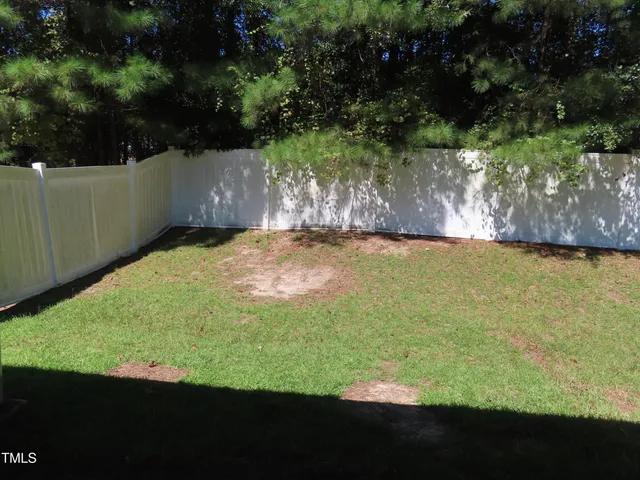 a view of an outdoor space and a yard